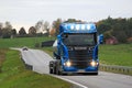 Blue Scania R580 Tank Truck on Dusktime Road